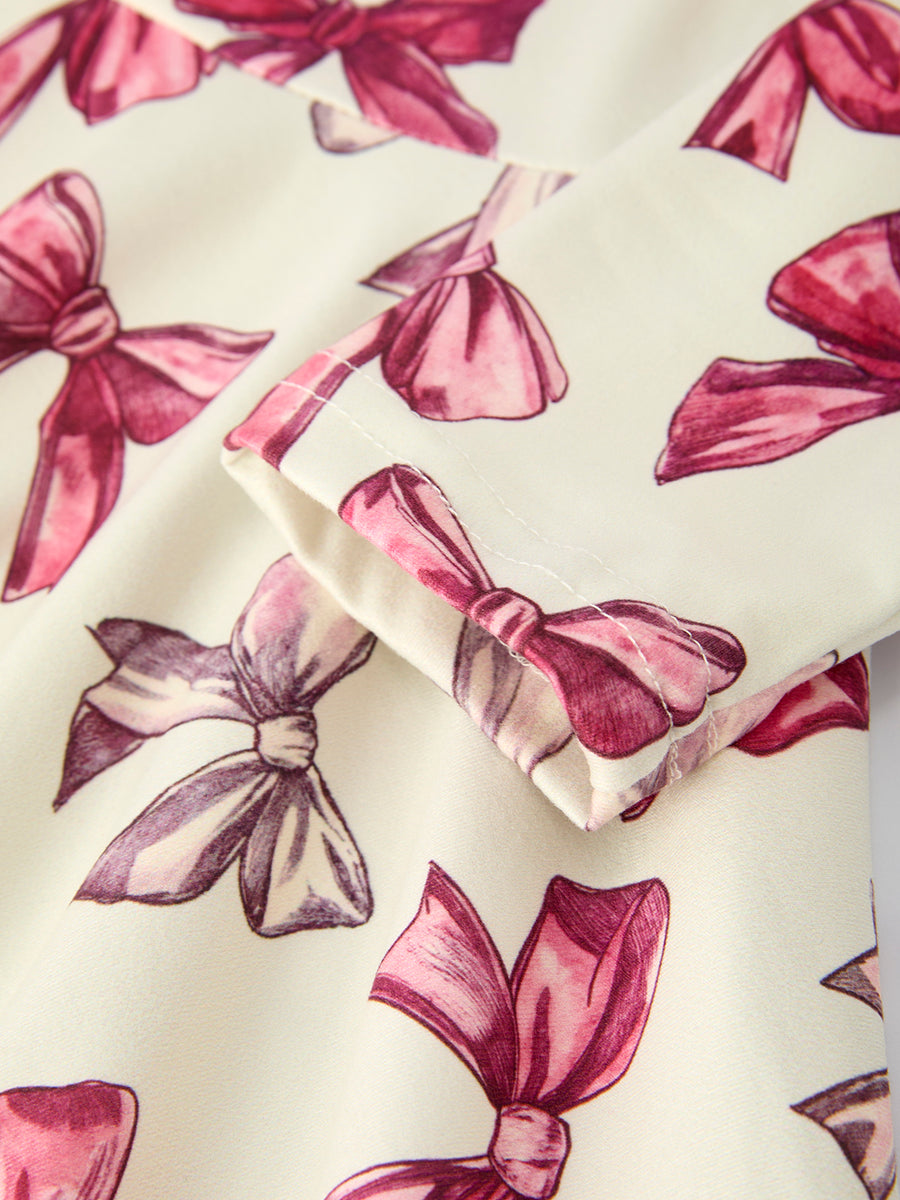 Girls Long Sleeve Dress with Pink Bow Print and Ruffle Hem